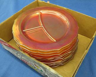 Lot 100. Ten carnival glass plates
