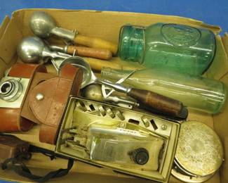 Lot 87. Vintage camera, ice cream scoops, Bicentennial Ball jar, a bottle from Gluek Brewing Co. Minneapolis, and more