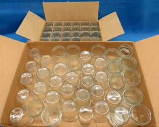 Lot 117. Sixty jelly jars for canning.&nbsp; Various sizes.