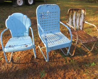 Lot 243. Three metal chairs