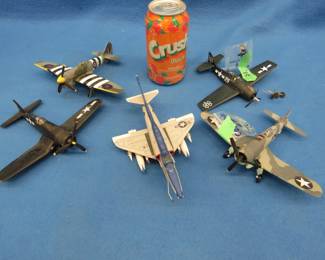Lot 343. Five die-cast planes
