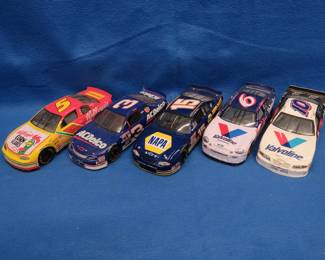 Lot 60. Five NASCAR die-cast cars