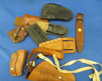 Lot 40. Leather holsters and sheathes