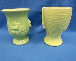 Lot 346. Two 8 1/2" McCoy vases.&nbsp; Both in very good condition.
