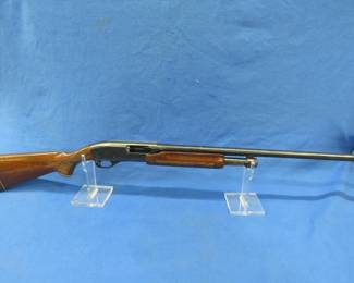 Lot 28. S/N: W245169M Remington Model 870 Magnum 12-gauge pump-action shotgun, 2 3/4 or 3" shellsng and scratches. S/N: W245169M