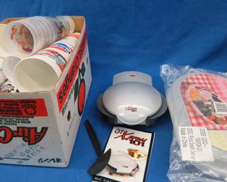 Lot 269. Lots of old sports game drink cups, a portable snack tray, and a snack maker