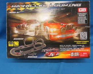 Lot 69. Parallel looping electronic race set in original box.&nbsp; Untested.