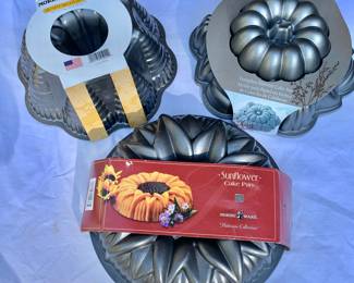 3 Bundt pans photo #1 - $10 each top 2; $20 Nordic Ware Sunflower bundt (TOP LEFT SOLD AC)