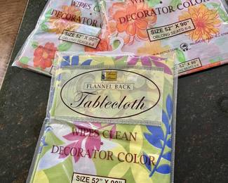 $8 each - Vinyl tablecloths (SOLD 1 ORANGE FLOWERS)