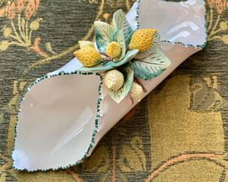 $40 - Signed, Italian napkin holder. 4." H, 12.5" L, 4.5" W