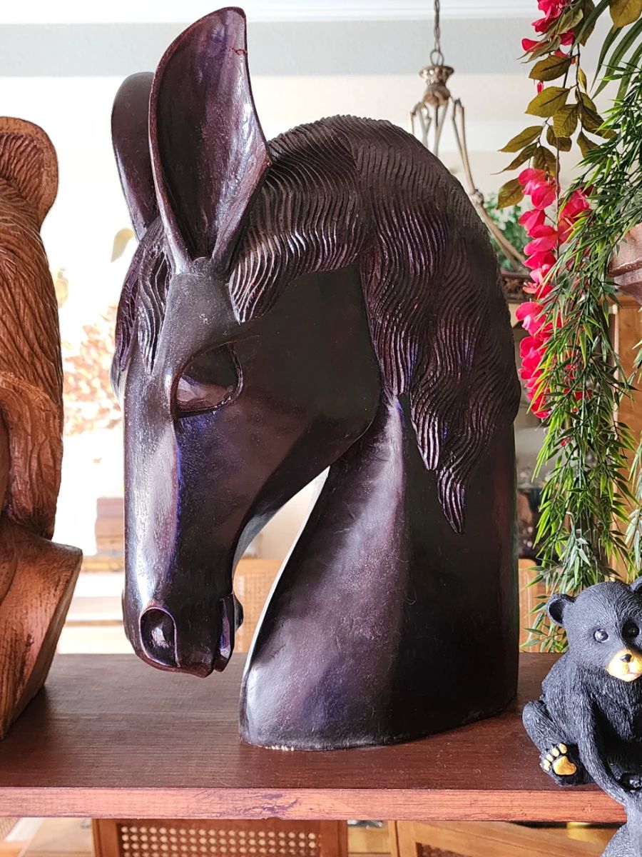 carved wood horse head