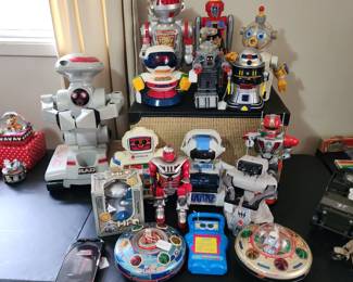 A large collection of toy robots and space related toys!