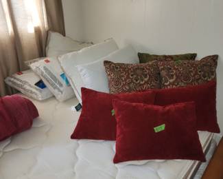 Pillows and several comforter/duvet sets
