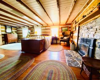 Brass bed , side tables ,  area rugs, lamps, leather wing chair , wooden side chair, mirrors , dresser 