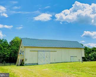 Bank barn with tools , equipment 