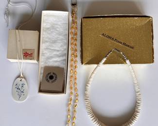 3 New In Box Necklaces From The Smithsonian, The December Store & Hawaii
Lot #: 98