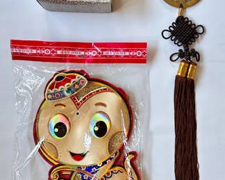 Vintage Chinese Solid Brass & Macrame Wall Hanging In Original Box & Paper Party Decoration`
Lot #: 162