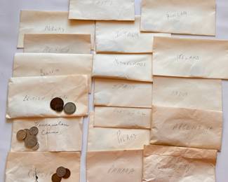 International Currency: 18 Envelopes Each With A Few Coins
Lot #: 34