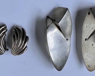 Vintage Extra Large Modernist & Seashell Shaped Sterling Silver Earrings
Lot #: 42