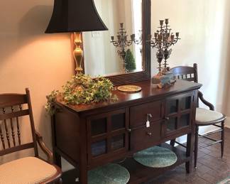 Buffet/entry/sofa table; large mirror; lamp; candelabras; antique chairs