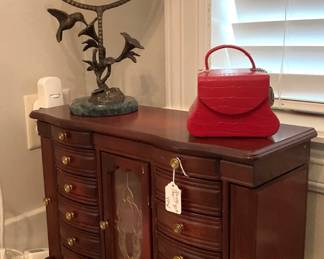 Small jewelry keeper; magnifying mirror