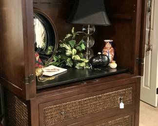 Caned/wood entertainment center with 3 drawers of storage