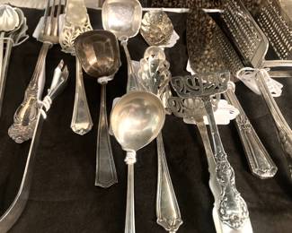 Variety of sterling and silverplate serving pieces