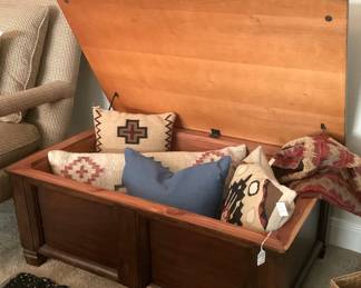 Chest with an assortment of pillows