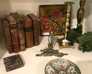 Antique books; brass candle holders; Asian bowl