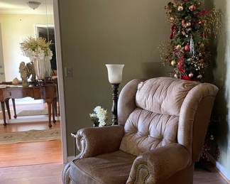 Leather Recliner, Floor Lamp, Antique Entrance Table Silk Floral Arrangement