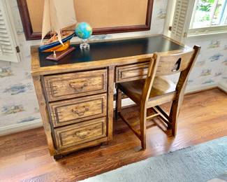 $295 - Vintage Ranch Oak Desk and Chair - 30" H, 44" W, 18" D; chair - 32.5" H, 17" W, 17" D, seat height 18"; model sailboat - 21.5" H, 18" L, 3.5" W; corkboard - 60" H x 39" W