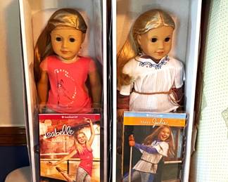 American Girl Dolls "Isabelle" and "Julie" with books.  Never removed from box.