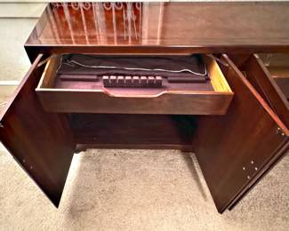 Asian server opened to reveal roomy silverware drawers