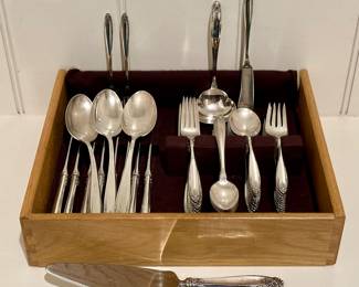 International Sterling Silver "Prelude" - 8 soup spoons, 8 knives, 15 teaspoons, 8 dinner forks, 11 salad forks, 1 ladle, 1 pie server, 3 serving spoons, 2 pickle forks, 1 master butter knife, 8 butter knives