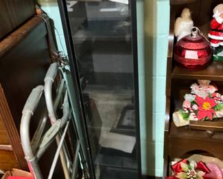 Tall case with shelves, walker & miscellaneous