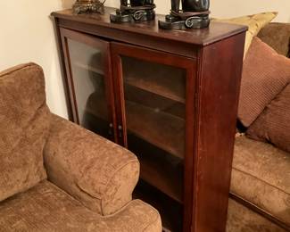 Glass front cabinet with shelves