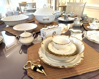 Fine china and daily dinnerware, serving platters, round glass-top table with set of 6 dining chairs, set of matched china cabinets, sideboard, fine glassware, cake stand