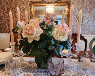 Nice Florals throughout the home. Crystal candelabras 