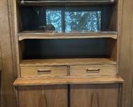 Magnificent Mid Century Modern Hutch / Cabinet by Garrison features a lovely retro appearance.

A nice petite size, measures 65 x 35 x 15 inches. It features two drawers and a lower storage area plus shelving to display your treasures. In overall good condition with some light vintage wear. 
