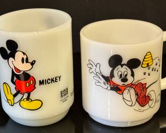 Two Vintage Mickey Mouse Milk Glass Mugs, measuring 3.5 an 4 inches