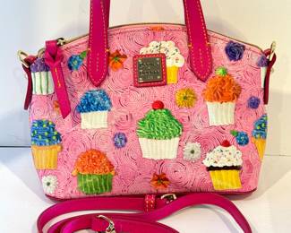 Dooney & Bourke Pink Cupcake Satchel - New without tags. 

Measures 9" x 4" x 8" 