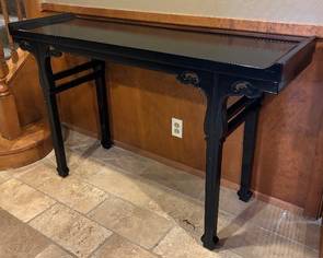 Vintage Asian Flair Black Console Table. Features a sophisticated, sleek design. In overall good condition with light wear and measures 55" x 16.5" x 34.5" 