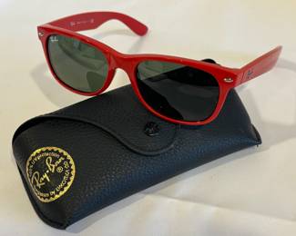 Pair of Red Frame Ray Ban Sunglasses with Case in good/used condition with some wear. 