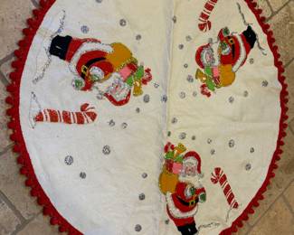 MCM Retro Christmas Tree Skirt in an adorable Santa pattern! In overall very good condition for age and use. A couple small stains, but not overly noticeable. Measures 42 inches in diameter. 