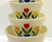 Vintage MCM Fireking Tulip Nesting Bowl Set. Includes four nesting bowls in graduated sizes and nest in each other. In overall very good condition with light wear. 

Mid 20th Century (1941-1969)

Measures approx. larger 9.5X6, medium 8.5X5.5, small 7.5X4.75 and extra small 6.5X4 inches 