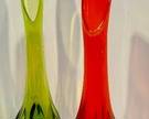 Two Mid Century Viking Swung Glass Vases

Mid Century Amberina Swung Glass Vase, measuring 19 inches tall. 
Mid Century Green Viking Swung Glass Vase, measuring 23 inches tall. 
