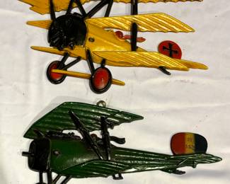 Two Vintage Homco Metal Airplane Wall Plaques. The largest measures 8 x 12 inches. Light wear. Neat decor! 