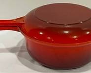 Le Creuset Covered Enameled Cast Iron Saucepan #16. Item in very good condition with light wear/use.

Use the top as a skillet! 