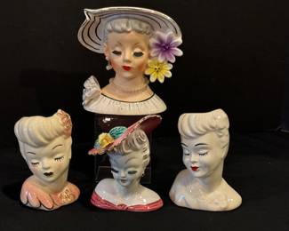 Four Vintage Lady Head Vases. Items in vintage condition with some wear which may include paint loss and light crazing. 

Measuring between 5-6 inches tall. 