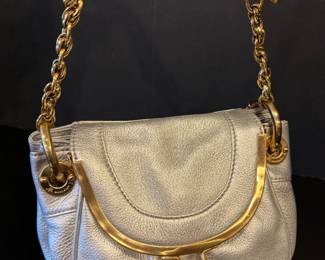 B. Makowsky Silver Leather Handbag. A lovely, elegant handbag! Item in very good/like new condition. 

Measures about 10" x 5" x 6"